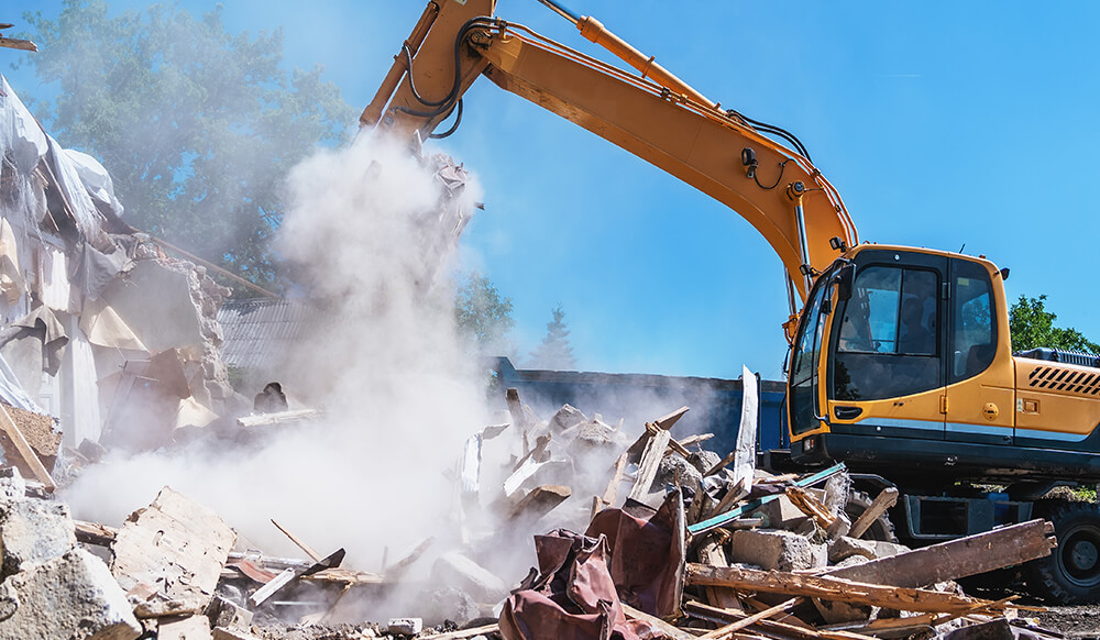 a large machine performing demolition 